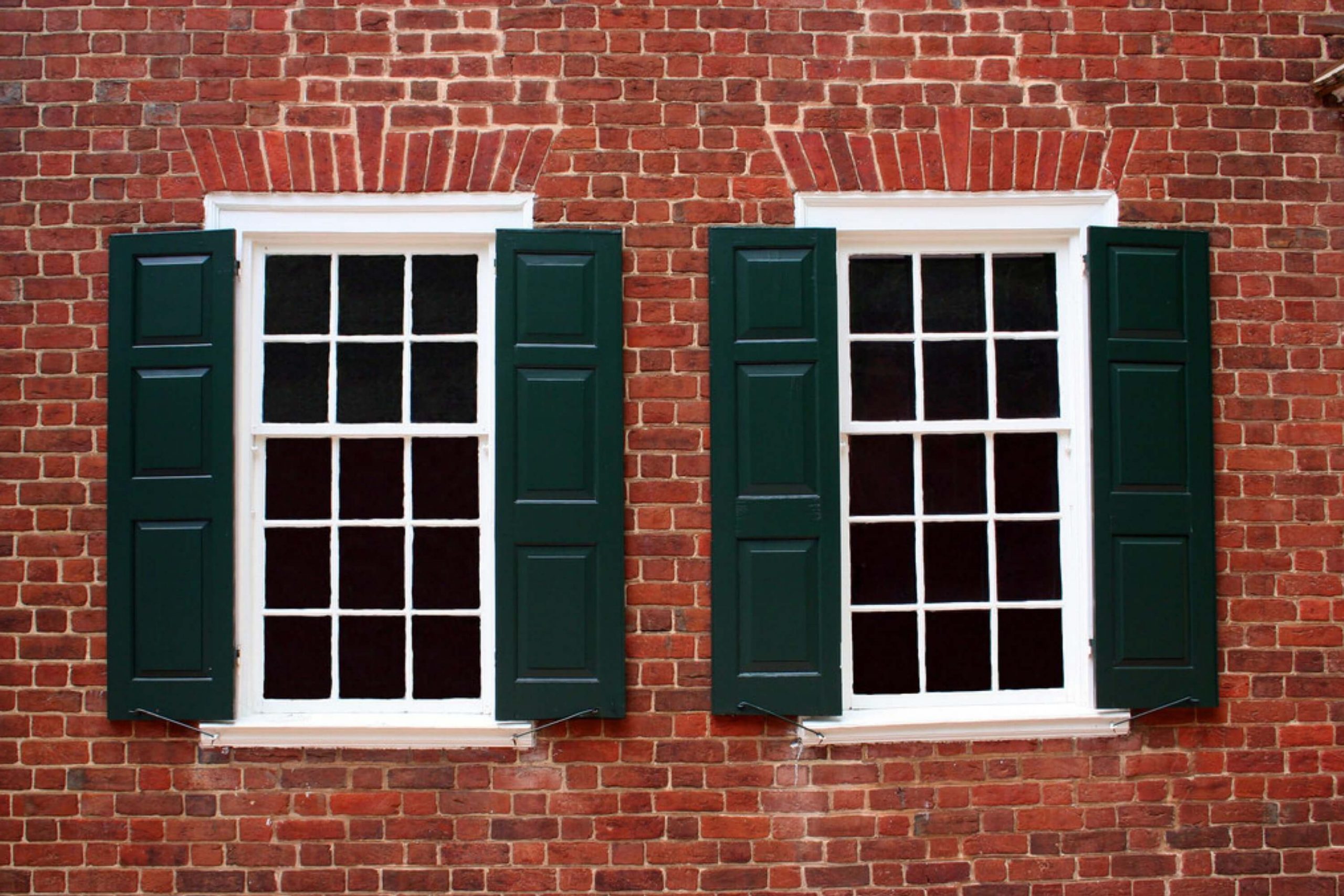 Tan House And Green Shutters