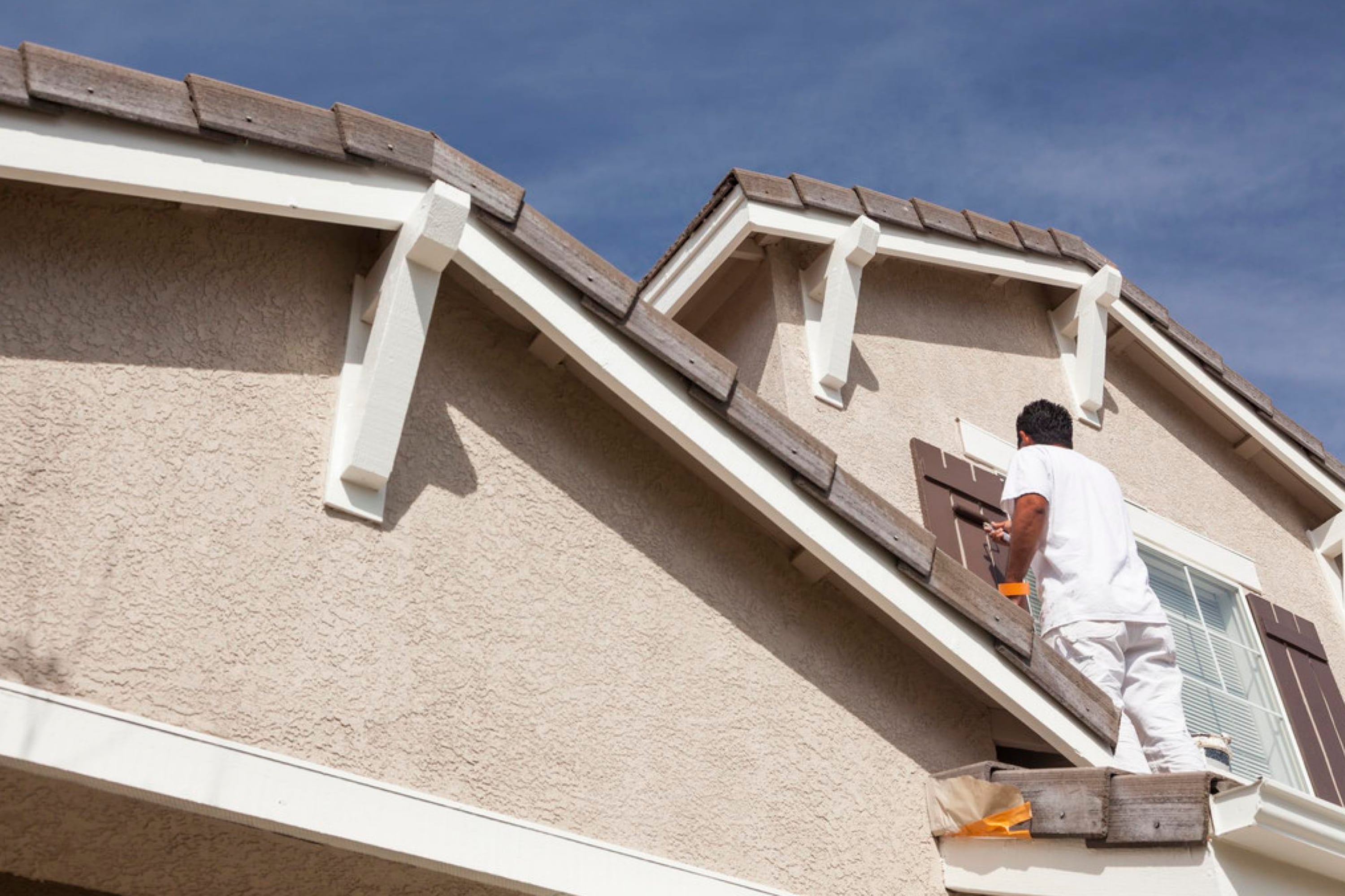 Tips For Painting a Metal Roof With Rust