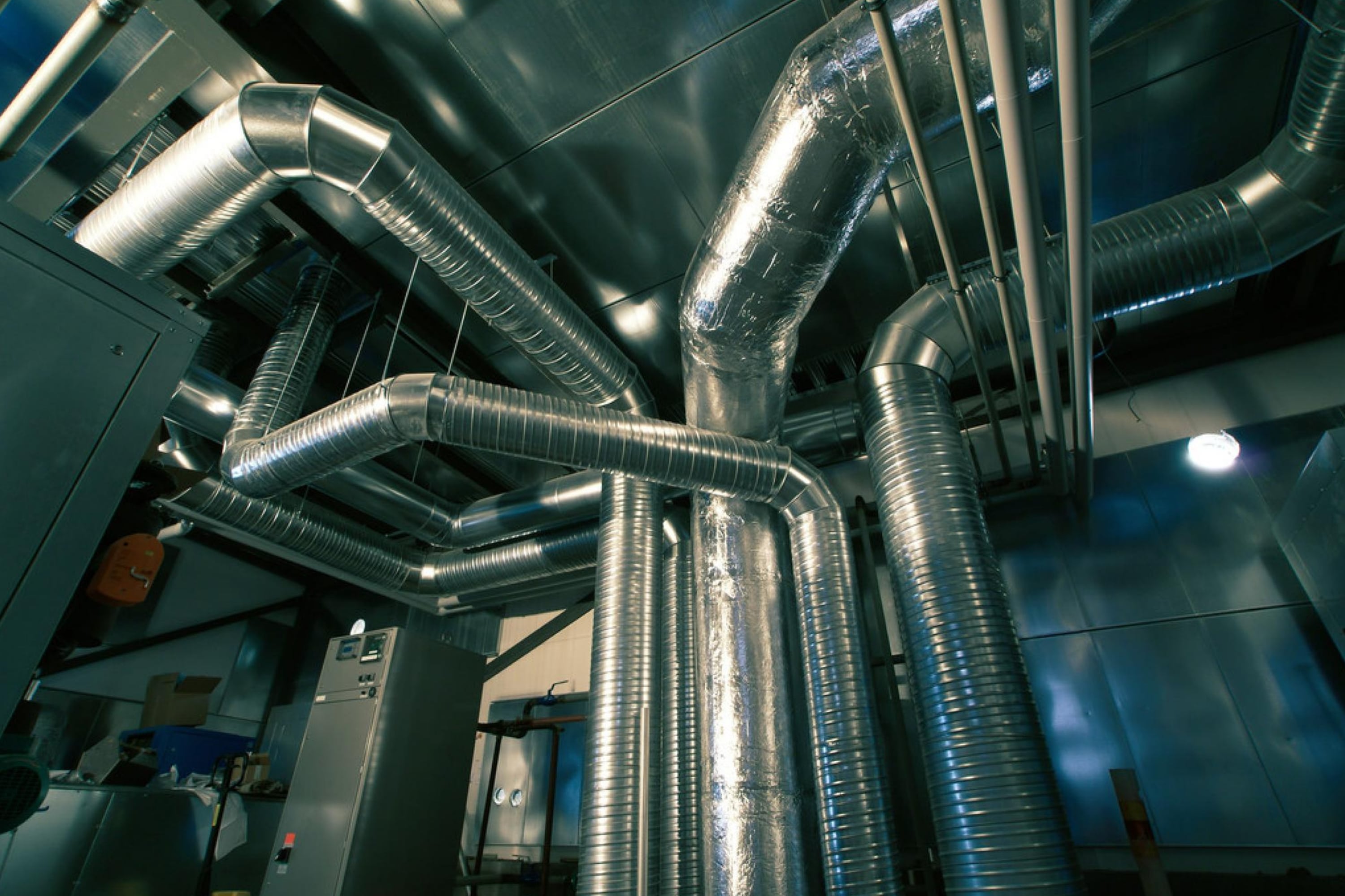 How to Cover Exposed Ductwork In Your Basement